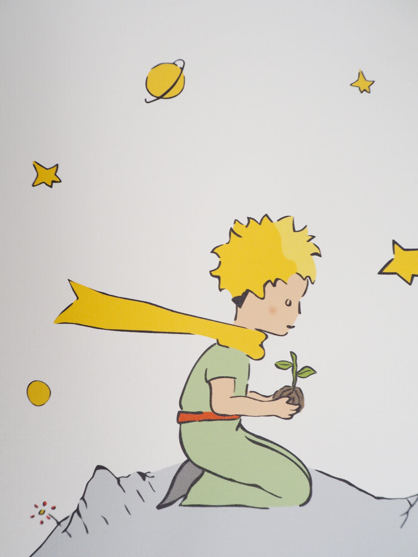 Antoine DE SAINT-EXUPERY : Le Petit Prince plante une fleur sur son astéroïde - Lithographie