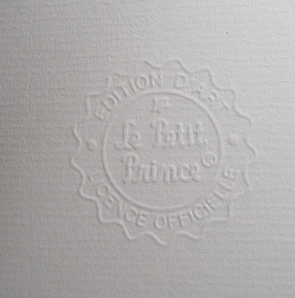 Antoine DE SAINT EXUPERY : Le Petit Prince sur une balançoire - Lithographie